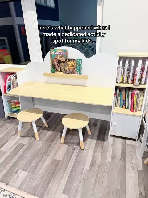 If you’re looking for toddler activity storage, a kids reading desk, or a toddler learning table… this setup combines bookshelves, activity storage, and a kid-sized desk all in one spot. Perfect for independent play, coloring, puzzles, crafts, and screen-free activities 🤍 #toddleractivities #playroomideas #learningthroughplay #toddlermom #independentplay