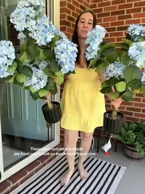 I wanted my front porch to feel a little more like summer, so I added these gorgeous blue hydrangeas. They instantly made my entryway feel brighter, more welcoming, and honestly look way more expensive than they were.#dealsforyoudays #flowers #artificialflorals #hydrangeas #florals 