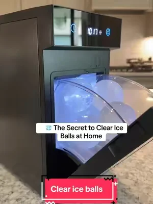 This sphere ice maker creates up to 48 crystal-clear ice balls every 24 hours and even includes accessories like a water tester! The better your water quality, the clearer your ice spheres will be. Perfect for cocktails, iced coffee, mocktails, and elevating every drink. #SphereIceMaker #IceBalls #HomeBar #icemachine #icemakermachine 