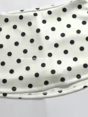 White polka dot skort = instant summer outfit. Built-in shorts, comfy stretch, and way too easy to style. #skort #polkadotskort #polkadotoutfit #summeroutfit #tiktokshop