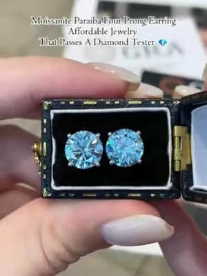Moissanite Paraiba Four Prong Earring.Affordable Jewelry That Passes A Diamond Tester💎💯#summerwins #tiktokshopdealsforyoudays #dealsforyoudays #earrings #moissaniteearrings #2026 #delzzad #waterproofjewelry #jewelry #giftideas #viral #delzzadjewelry #nontarnishjewelry #beautiful #luxury #affordable #diamond #diamondtester #paraiba #s925 #s925silver #silver #silverjewelry