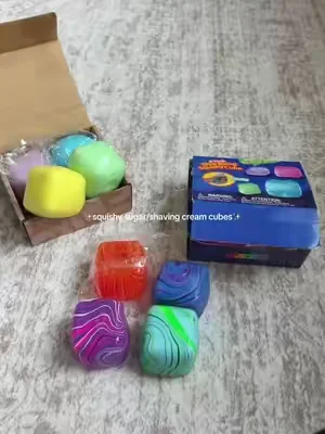 the candy color is either shaving cream or slime inside i cant tell #stressballs #squishy #summeressentials #summervibes #squishycube 