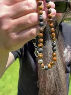 This is a man’s 8 mm tiger eye and lava bead necklace. Ate your fashion to the next level without going over the top sometimes a simple beaded jewelry is all you need. If you’re looking for that 1900 style vibe, SoCal Beach era men’s fashion  ! #summerwins #dealsforyoudays #beads #tigereye #genz  