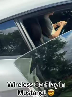 No more annoying cords #carplay #wireless #cords #mustang 