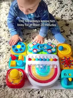 This busy board actually keeps him busy and is one of his favorite toys! I love it becauae it is helping him learn and develop too! #busyboard #babytoy #toddlertoy #SummerWins #DealsForYouDays 