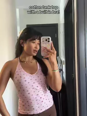 Racerback cotton tank with a built in bra a removable padding is amazing for the summer! From the brand danysu. #tanktops #tanktopstyle #racerbacktank #summertops #summerclothes 