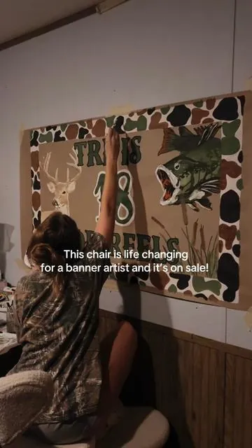 This chair is life changing for someone who paints banners When I bought it, it was $119 and now it’s almost half off which is INSANEEEEEEE. #art #bannerpainting #pinmoco #bannerchair #paintedbanner 