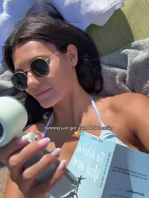 Book in one hand, fan in the other #portablefan #summerwins #dealsforyoudays #tiktokshopcreatorpicks #fan 
