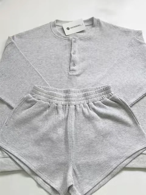 This grey waffle set is cozy, easy, and still cute enough to wear out. #waffleknit #loungewearset #matchingset #greyoutfit #cozyoutfit
