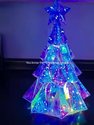 You know that Christmas house everyone slows down to admire? The magical one that kids remember and neighbors talk about? You don't need a yard full of decorations to create that feeling. Sometimes all it takes is one beautiful statement piece that sparkles day and night to make your home feel warm, festive, and unforgettable...like this @QVC holographic tree ✨🎄 #ChristmasDecor #QVC #holographic  #holidaydecor  #christmastree 