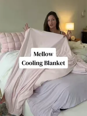 The best summer time blanket 🥶🩵 #coolingblanket #summerbedding #mellowsleep #dealsforyoudays 