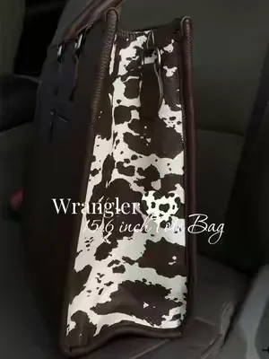 Beautiful tote bag ! Obsessed with the cow print 🐮 #cowprint #wrangler #totebag #wranglertotebags #wranglerbags 