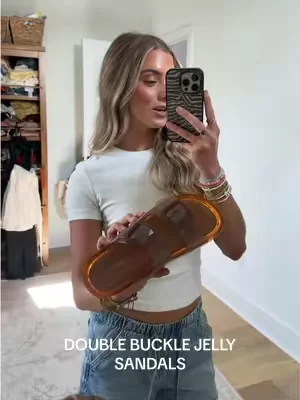 these double buckle jelly sandals are the best of both worlds especially if you’re not on board with jelly ballet flats it’s a version with the double strap sandal  #summersandals #summershoes #sandals #jellysandals #dealsforyoudays @Cushionaire 