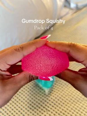Has such a good squeeze to it!! Comes in a pack of 4 🩷💙💜🧡 #squeezeball #fidgettoy #needoh #gumdropsquishy #dealsforyoudays 