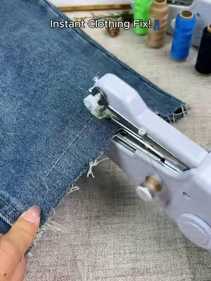 #sewingmachine #minisewingmachine #handheldsewingmachine #tailor #homeessentials 