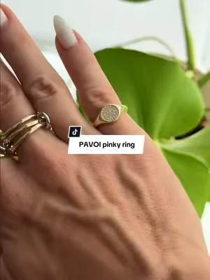 This pink ring is so much prettier in person and I’m so glad I got it.  @PAVOI  #pinkyring #ringstack #tarnishfreejewelry #dealsforyoudays #tiktokshopcreatorpicks 
