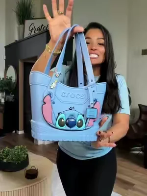 @Crocs dropped The Disney Stitch Tote and this Crocs Tote bag is my favorite!  I’ve loved Lilo & Stitch as a child and now I have the tote bag (gasp) I’m obsessed!!! #crocs #liloandstich #totebag #nostalgia 