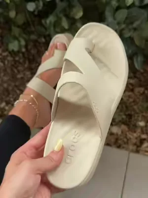 These Crocs Toe Loop Sandals are perfection! Such a comfortable sandal and perfect for daily errands, walks, summer activities etc. The neutral colors are beautiful and these always go fast! The perfect sandals for women! #crocs #crocssandals #sandalsforwomen #sandals #shoesforwomen 