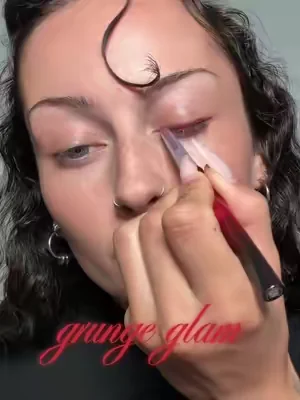 Nobody does colorful grunge quite like @Frankie Darling ⛓️✨ 💫 #KaleidosEyeliner in Scarlet Striker 💫 #SpaceAgeHighlighter in Moon Cruiser 💫 #SculptingLipPencil in Dark Matter 💫 #GlassloadLipMelt in Prismelt #grungemakeup
