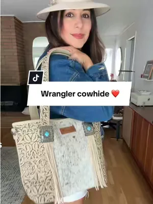 Replying to @cha-cha pina NEW Wrangler Real Cowhide handbag is 🔥  it is stitched to perfection!. Perfect size bag to carry everything you need! This won’t last! #wranglerpurse #spotlightfinds#tiktokshopcreatorpicks  #dealsforyoudays #westernfashion
