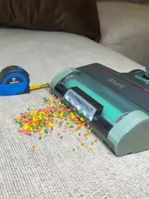 A vacuum so strong it literally PULLS the debris towards it 👀 #shark #sharkvacuum #stickvacuum #vacuum 