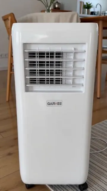 Beat the heat with the Garvee Portable AC! 🌬️ This powerful 3-in-1 unit offers cooling, fan circulation, and dehumidifying for any room up to 700 sq.ft. Experience quiet operation, a convenient 24-hour timer, and auto swing for wide air coverage. Control your comfort effortlessly with the remote. Perfect for your home or office oasis. Shop now to keep cool! #PortableAC #HomeComfort #DealsForYouDays #AIGC #Moras