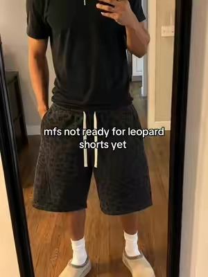 plain black tee kept it calm, shorts did the damage #leopardpants #printedshorts #mensshorts #fyp #baggyshorts 