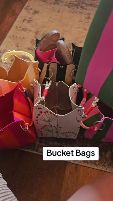 Bucket Bags in different colors and designs. They are going fast. While supplies last. #totes #bucketbag #totes #tote #totebag 