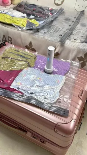 Fit three suitcases worth of clothes into one. #travelbetter #packsmart #vacuumstoragebags #tiktokfinds #fyp