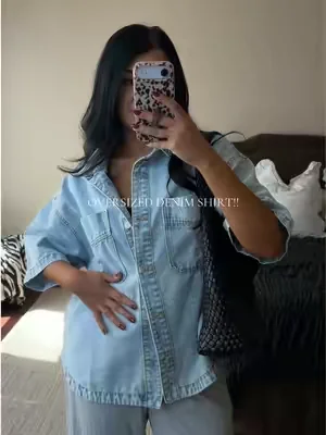 SIZE: XL. COLOR: LIGHT WASH. What a perfect wardrobe staple piece!! I love an oversized denim shirt especially when I can wear it in the warmer months too! So cute and boxy!! I love how long the sleeves are and big the pockets are! Oversized Denim Shirt. Denim Shirt Outfit. Outfit Inspo. #outfit #denimshirt #oversizeddenim #denimjacket #oversizedshirt 