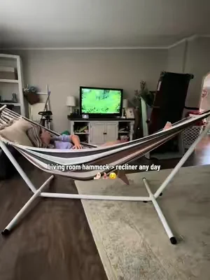 This living room hammock has been a game changer for us. The whole family loves it inside! #hammock #hammocklife #housedecor #relax 
