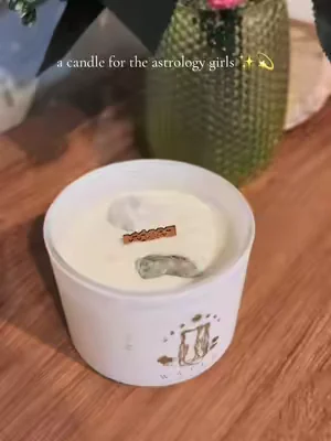 a zodiac sign candle with real crystals inside! ✨💫
