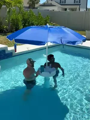 this floating pool umbrella floats right on its own and doesn’t scrape the bottom! #floatingpoolumbrella #poolumbrella #umbrella #poolaccessories 