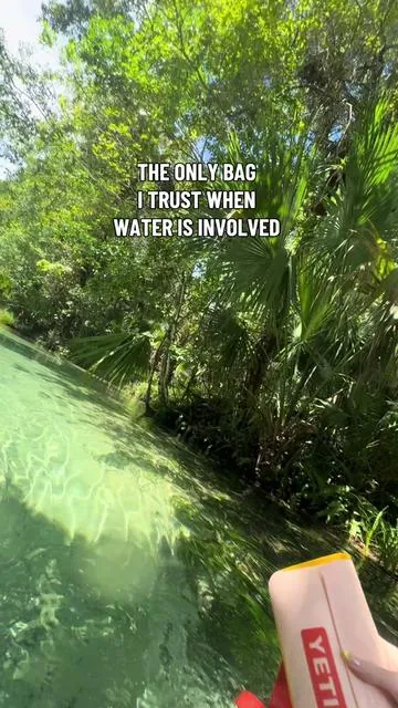 This is your sign to get the Yeti Sidekick.  Not only is it the cutest waterproof bag ever (and yes, it comes in multiple colors), but it seriously does not let water in. I've taken this thing to the Florida springs, the beach, the pool, even swimming in the ocean — and everything inside comes out 100% dry. It's compact but holds all the essentials: phone, keys, wallet, sunscreen, lip balm, cash — and it clips right onto your Yeti Camino or you can wear it as a crossbody for hands-free exploring. Waterproof, dustproof, sandproof, life-proof. Basically, if water's involved, this is the only bag I trust to keep my stuff dry. @YETI  #florida #yeti #outdoor #waterproof #waterproofbag 