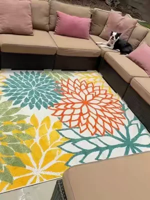 The perfect color pop for your patio. #outdoorrug #patiorug #rug #patiofurniture #backyarddecor 
