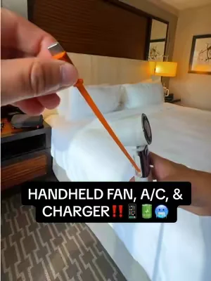 A handheld fan that can also charge your phone bro 🫨 #tiktokshop #handheldfan #fan #charger #minifan 
