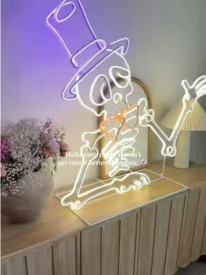 One oversized neon skeleton is all it takes to make your Halloween display stand out. The glow at night is unreal. 💀🧡🎃 #halloweendecor #spookyseason #fallfinds #tiktokshopfinds #hallowtiktok @QVC, Inc 