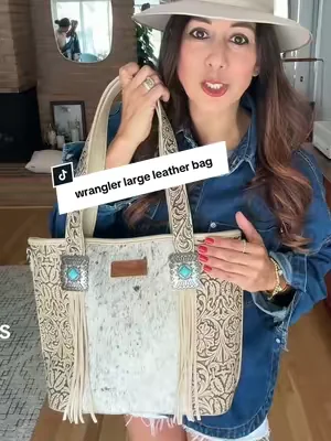 Replying to @xandra rae  NEW Wrangler Real Cowhide handbag is 🔥  it is stitched to perfection!. Perfect size bag to carry everything you need! This won’t last! #wranglerpurse #spotlightfinds#tiktokshopcreatorpicks  #dealsforyoudays #westernfashion
