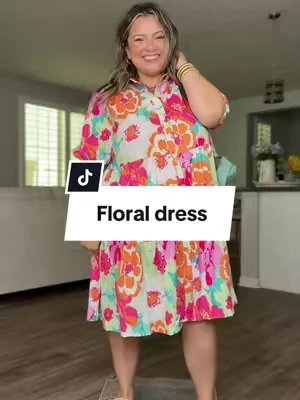 So excited about this vibrant big belly approved dress until my husband said it was ugly 😭 What do you think? #floraldress #plussize #vacationdress 