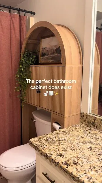 Obsessed with how aesthetic this makes my bathroom feel! Not to mention all of the storage #bathroommusthaves #bathroomdecor #bathroomstorage #hometok #homedecor 