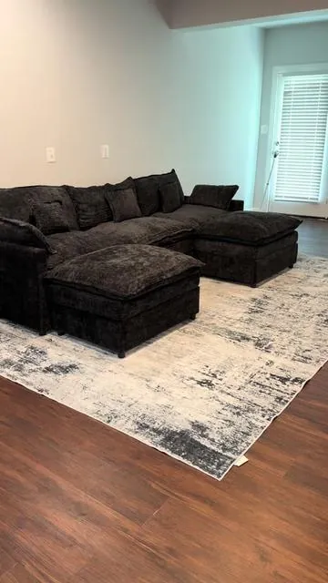 Replying to @BHAM LASH ARTIST ❤️ it’s more of an off black or dark charcoal grey. The lighting in your home will truly determine the color pay off. ❤️ #tiktokshopdealsforyoudays #dealsforyoudays #cloudcouch #modularsofa #summerwins 