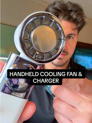A mini fan that has a cooling function like an A/C AND can charge your phone 📱 #tiktokshop #handheldfan #fan #coolingfan #charger 