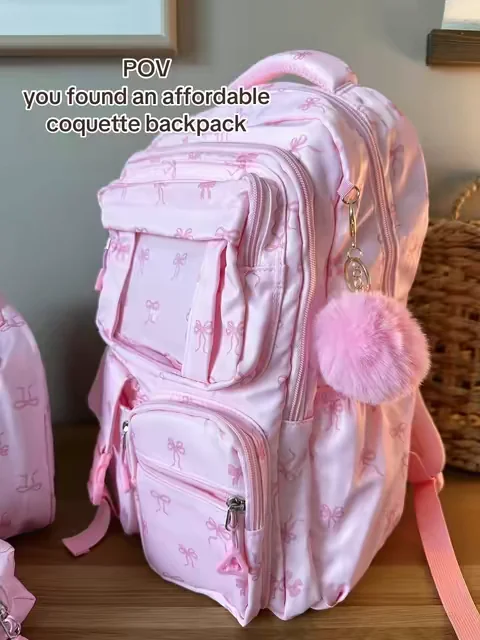 The cutest coquette backpack set 🎀 she’s obsessed and so am I! #backpack #backtoschool #girlmom 