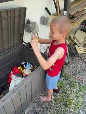 I used an outdoor storage bin as a toy box for my kids.  We have Ben using these for tools and patio cushions when it rains but getting one for my kids toys was genius! #outdoorstorage #patiostorage #outdoortoybox #outdoortoys 