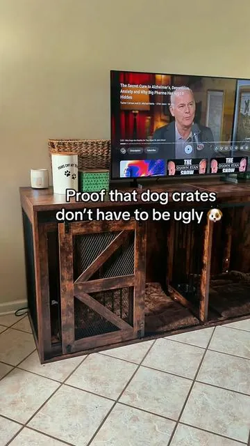 This farmhouse-style dog crate doubles as a beautiful tv stand while giving your pups a secure, comfortable space. Definitely one of my favorite dog owner finds! #dogcrate #dogcratefurniture #farmhousedecor #dogmom #petfurniture 