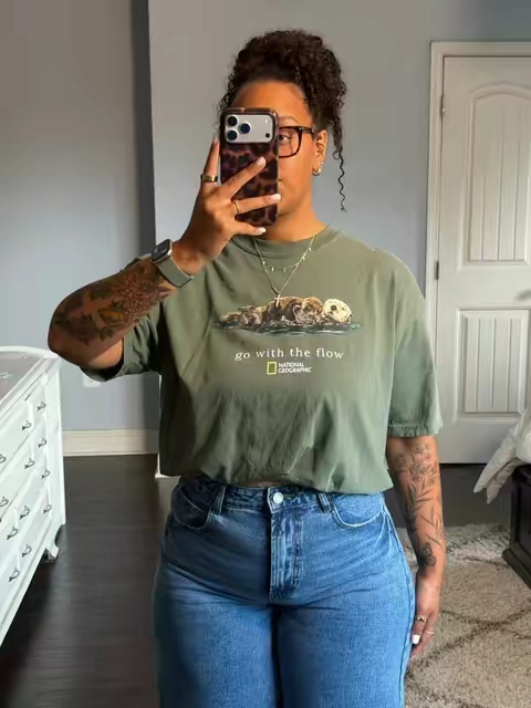 The oversized graphic tea that makes every outfit look effortlessly cool! Throw it on with barrel, jeans, comfy clogs, and you’re instantly ready for coffee runs errands or a casual day out the perfect oversized fit!  I’m 56 and 190 pounds wearing: Shirt: XL Jeans: 30 #OOTD #casualootd #casualfit #midsizefashion #tiktokshopcreatorpicks 