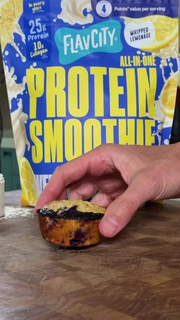 IT’S OFFICIAL: The FlavCity x @Weight Watchers limited-edition Whipped Lemonade Protein Smoothie is LIVE! 🍋🎉 Grab a bag on TikTok Shop! This collab is all about maximum summer flavor without the compromise. To celebrate, we’re baking up these incredible, protein-packed Blueberry-Lemon Muffins using the brand-new flavor. It's creamy, tart, and the ultimate way to fuel your summer mornings. Grab a bag, and save this recipe to make tomorrow morning! 👇 🫐 🍋 @ShopFlavCity x WW Blueberry-Lemon Muffins Ingredients: 2  ½ cups old-fashioned rolled oats 1 cup blueberries 3 scoops FlavCity x WW Whipped Lemonade Protein Smoothie powder 2 tsp Baking powder ½ tsp Kosher salt ⅔ cup 2% milk ⅔ cup unsweetened applesauce 2 large eggs ½ tsp lemon zest Instructions: In a blender, blend half of the oats until a fine flour forms. Transfer 2 tbsp to a medium bowl. Add blueberries to the bowl and gently toss to coat. In a large bowl, whisk the protein powder, baking powder, salt, remaining blended oat flour, and remaining whole oats. In a medium bowl, whisk together the milk, applesauce, eggs, and zest. Add to the dry mixture and stir until well combined. Gently fold in the coated blueberries. Divide the batter evenly among prepared muffin cups. Bake until a toothpick inserted in the centers of muffins comes out clean, about 18 to 20 minutes. Cool muffins in a pan on a wire rack for 10 minutes, then remove from the pan and cool completely. Refrigerate leftovers for up to 4 days. #muffins #protein #proteinrecipe #weightwatchersrecipe #wwrecipe 