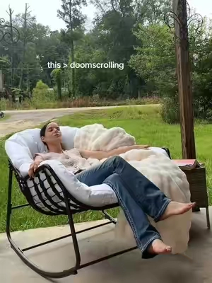 my new favorite spot  this oversized papasan rocking chair is on sale! #falldealsforyou  #patiofurniture  #rockingchair  #cozyseason 