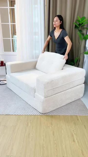 Scored this sofa that turns into a bed for basically nothing!!!🩵🤍💛#fyp #sofabed #couch #bonelesscouch #homedecor 