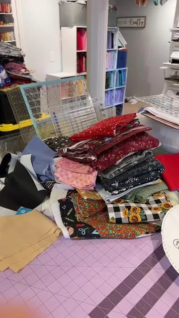 Do you need a better way to organize your fabric?  Look no further!  This over the door organizer is a great way to keep your fabric neat and tidy!  Check out the orange shopping cart today! #CraftingTherapyShop #fabricorganization #tiktokshop #SewTok #SewingOrganization 